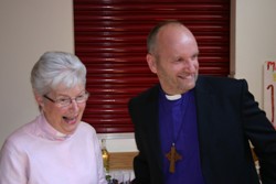 Enjoying the widows' tea are Canon Kathleen Brown and the Bishop of Connor.